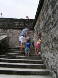 Climbing to the top of the fort walls