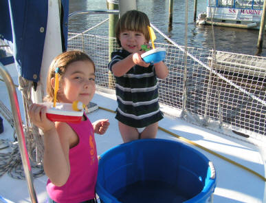 Kids play with new sailboats