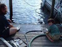 Justin & Aaron descaling fish
