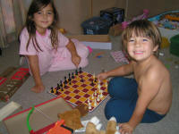 Yep, they actually play chess - Abi is teaching Aaron now