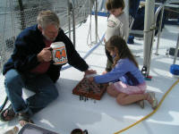 Claude teaching Abi to play chess